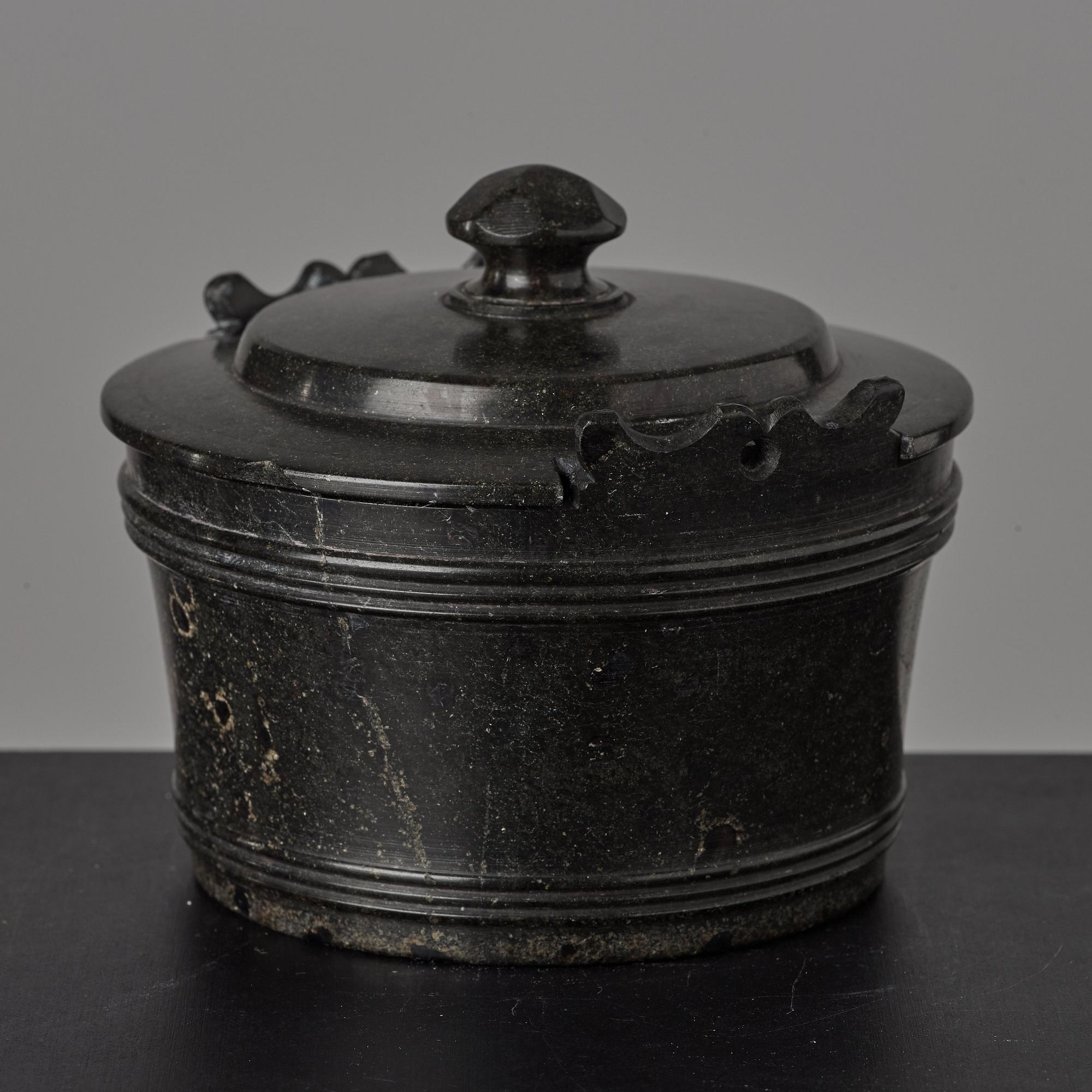 A serpentine stone butter box and cover circa 1800.