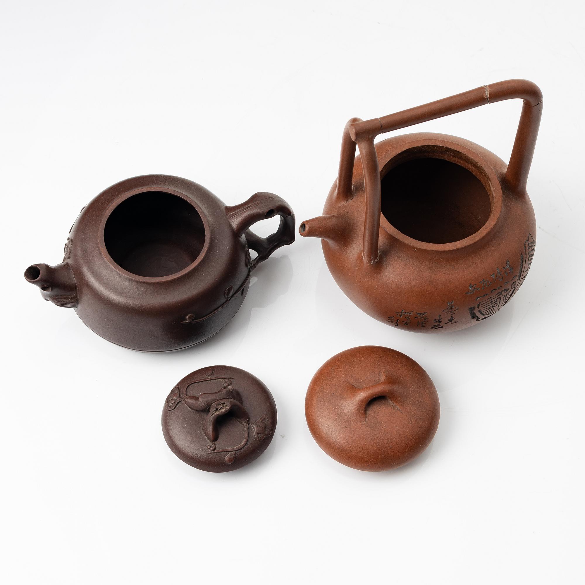 Two Chinese yixing teapots, early 1900s and 1980s.