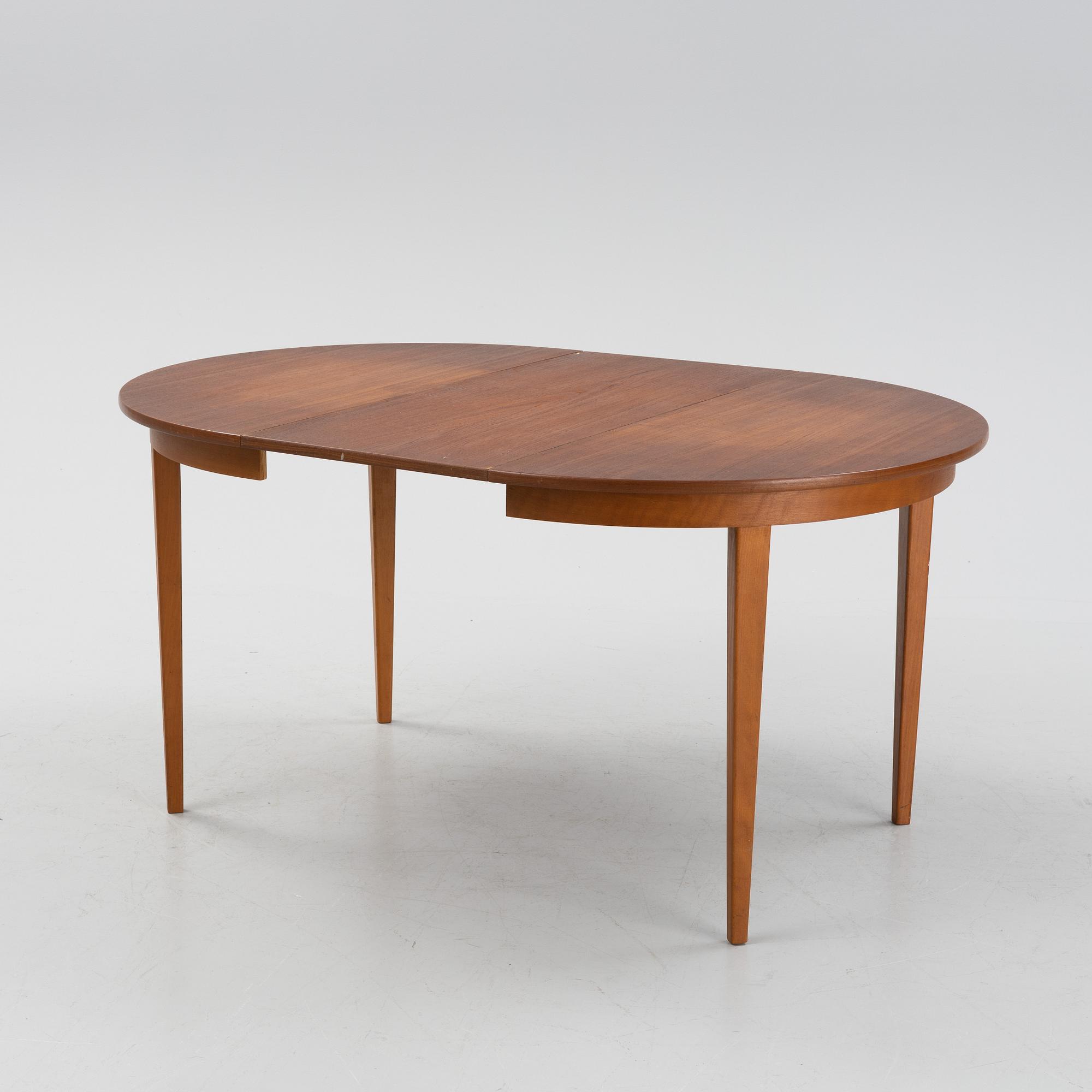A mid 20th century teak veneer table.