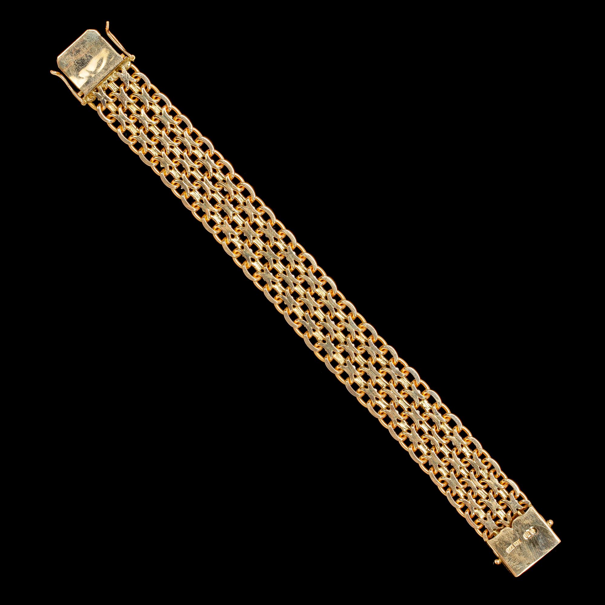 ARMBAND, x-länk, rätt och vitt guld. Vikt 62,7 g.