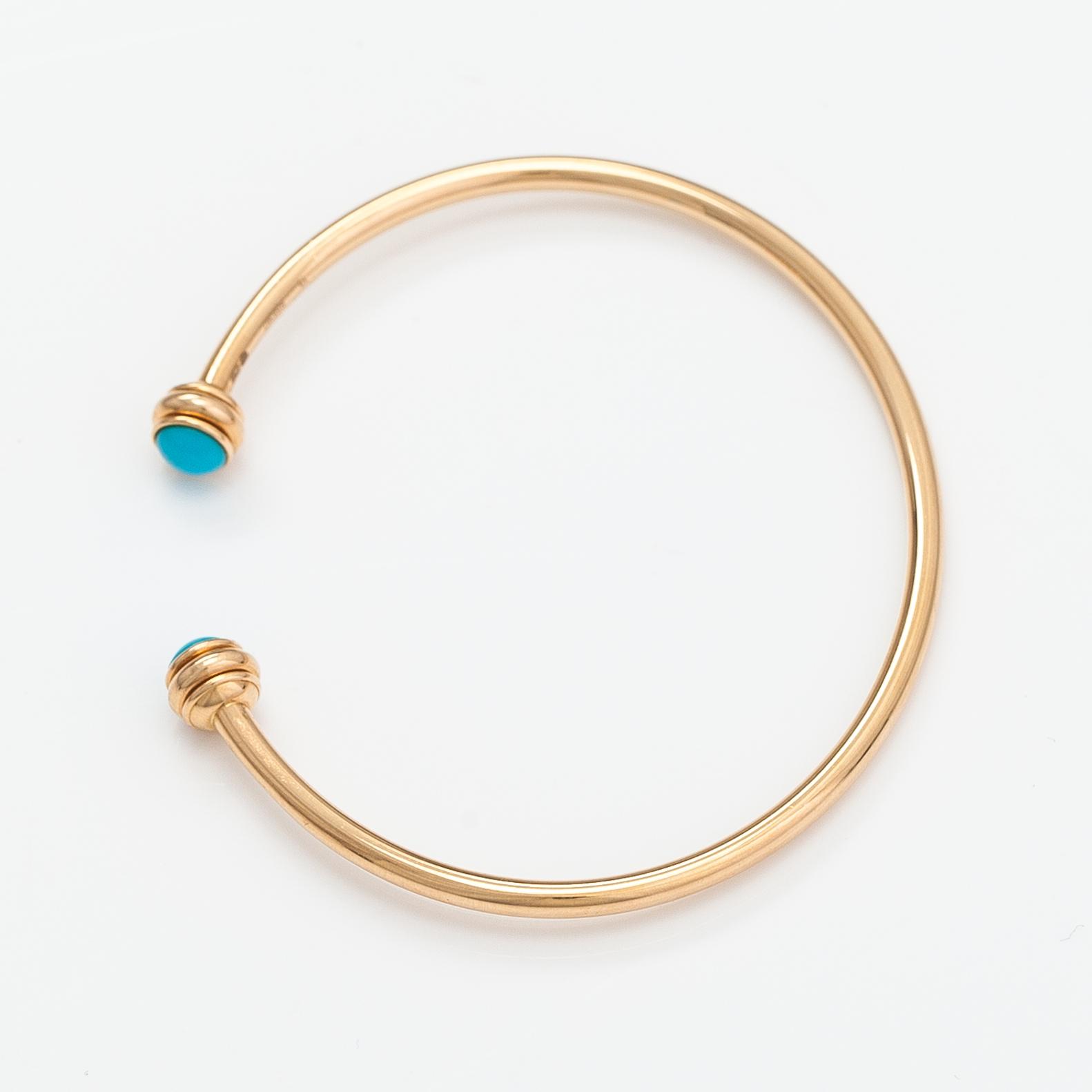 Piaget, A "Possession" bracelet made of 18K gold with turquoises. Marked Piaget R58367, 15.