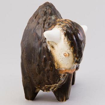 A Ceramic Figurine, signed T Kaasinen Arabia Finland.