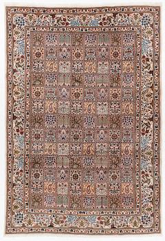A Moud carpet, part silk, approx. 285 x 195 cm.
