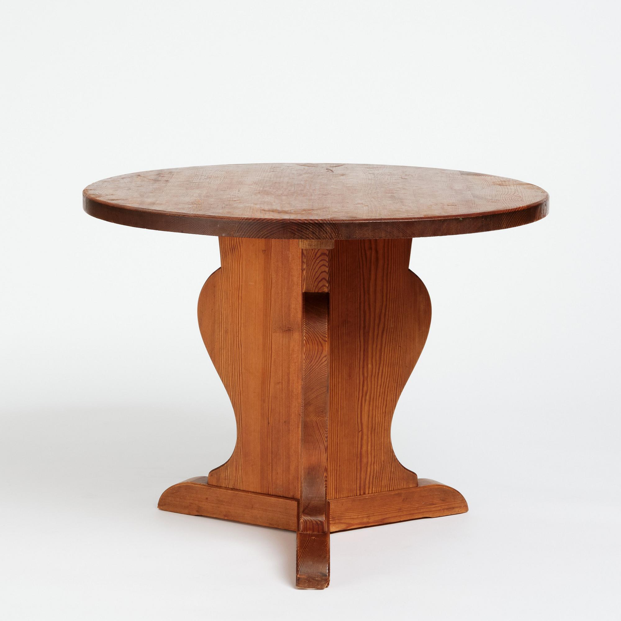 Nordiska Kompaniet, a stained pine circular top 'Lovö' table, ca 1941.