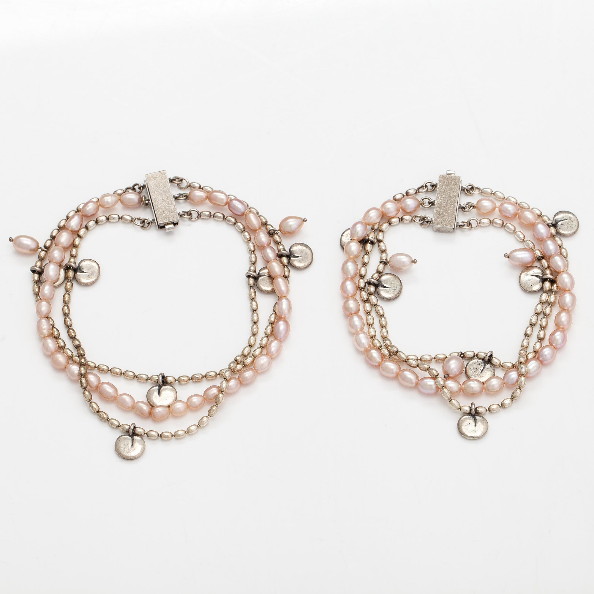 Kirsti Doukas, a necklace, pair of earrings and two bracelets, 'Vanamo', sterling silver, and cultured pearls.
