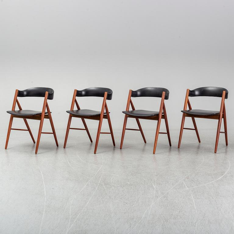Four 1960s teak chairs.