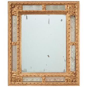 89. A North-European Baroque giltwood mirror, circa 1700.