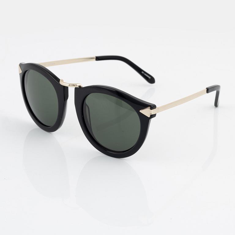 Karen Walker, a pair of "Harvest" sunglasses.