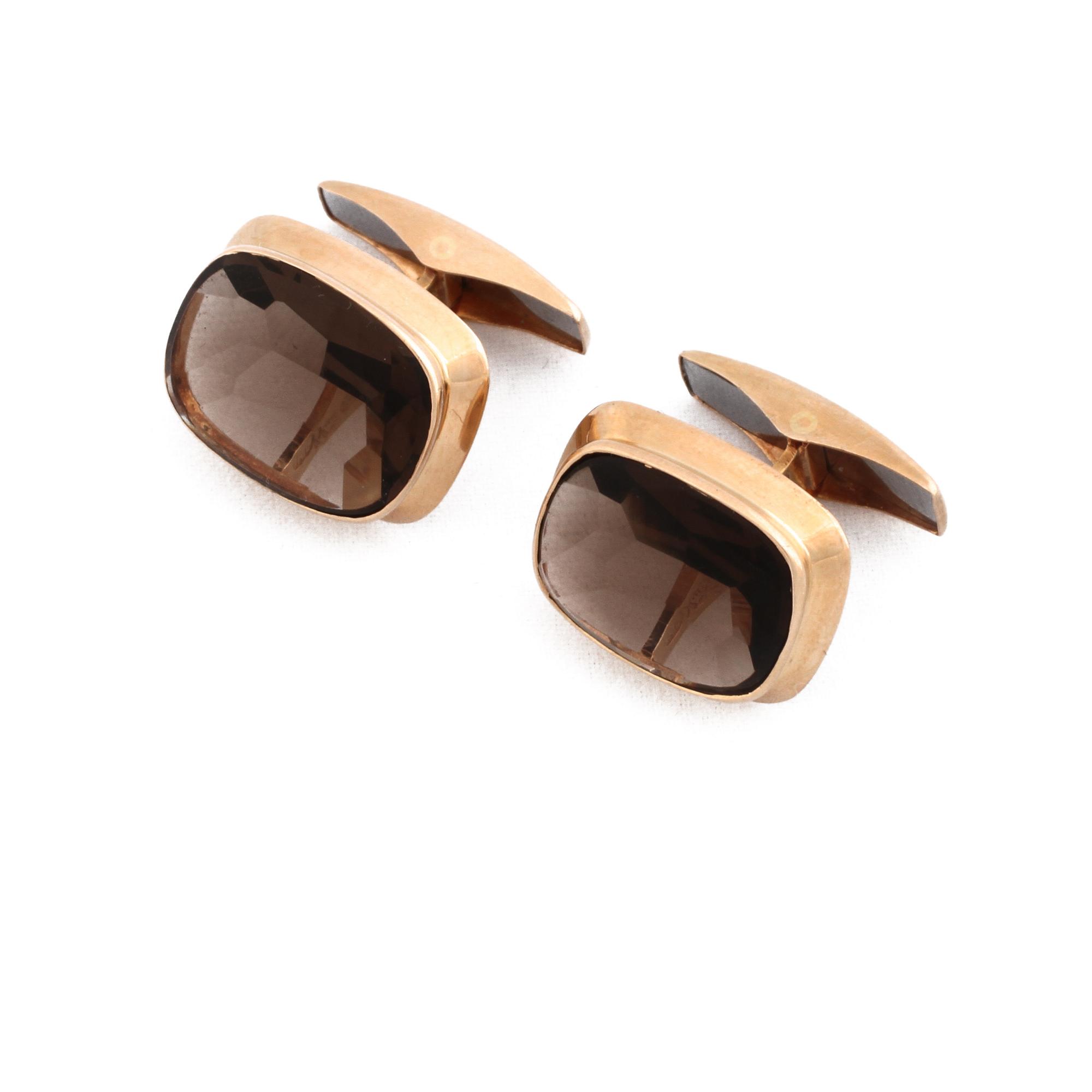 MANSCHETTKNAPPAR, 14K guld med fasettslipad rökkvarts, stämplade RL, Turku, Finland, 1967. Vikt 7,3 g.