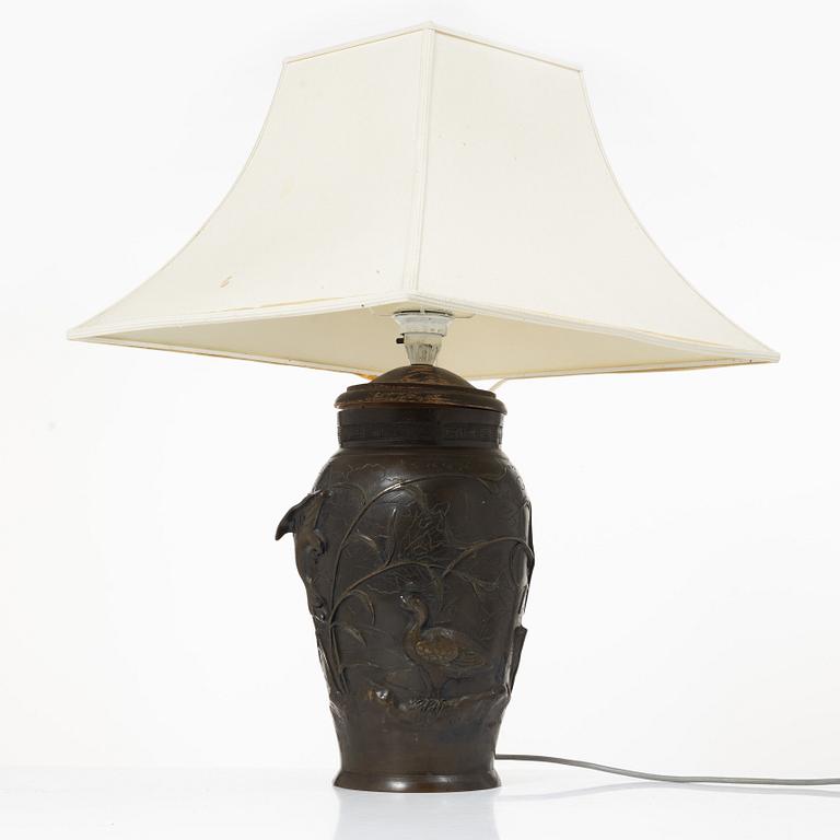 A Japanese bronze table lamp, 20th century.