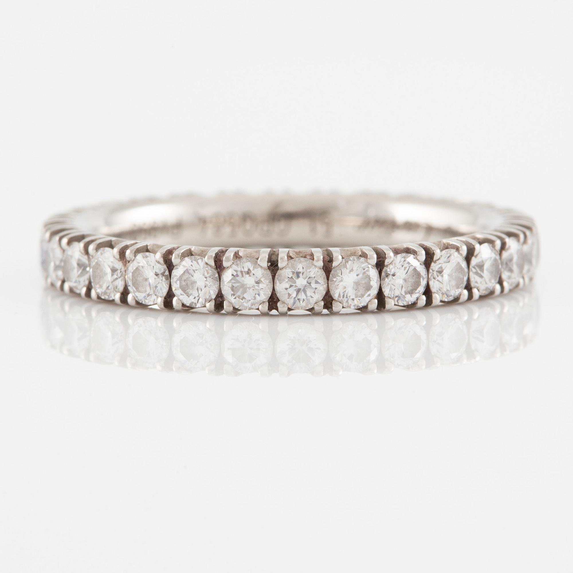 Cartier eternity ring in platinum with round brilliant-cut diamonds.
