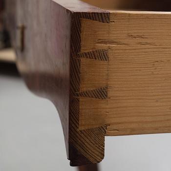 a mahogany rococo-style desk from the second half of the 19th century.