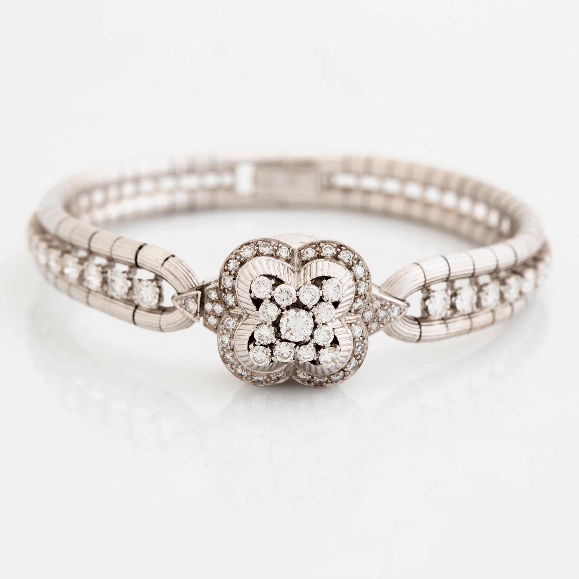 Omega brilliant cut diamond watch.