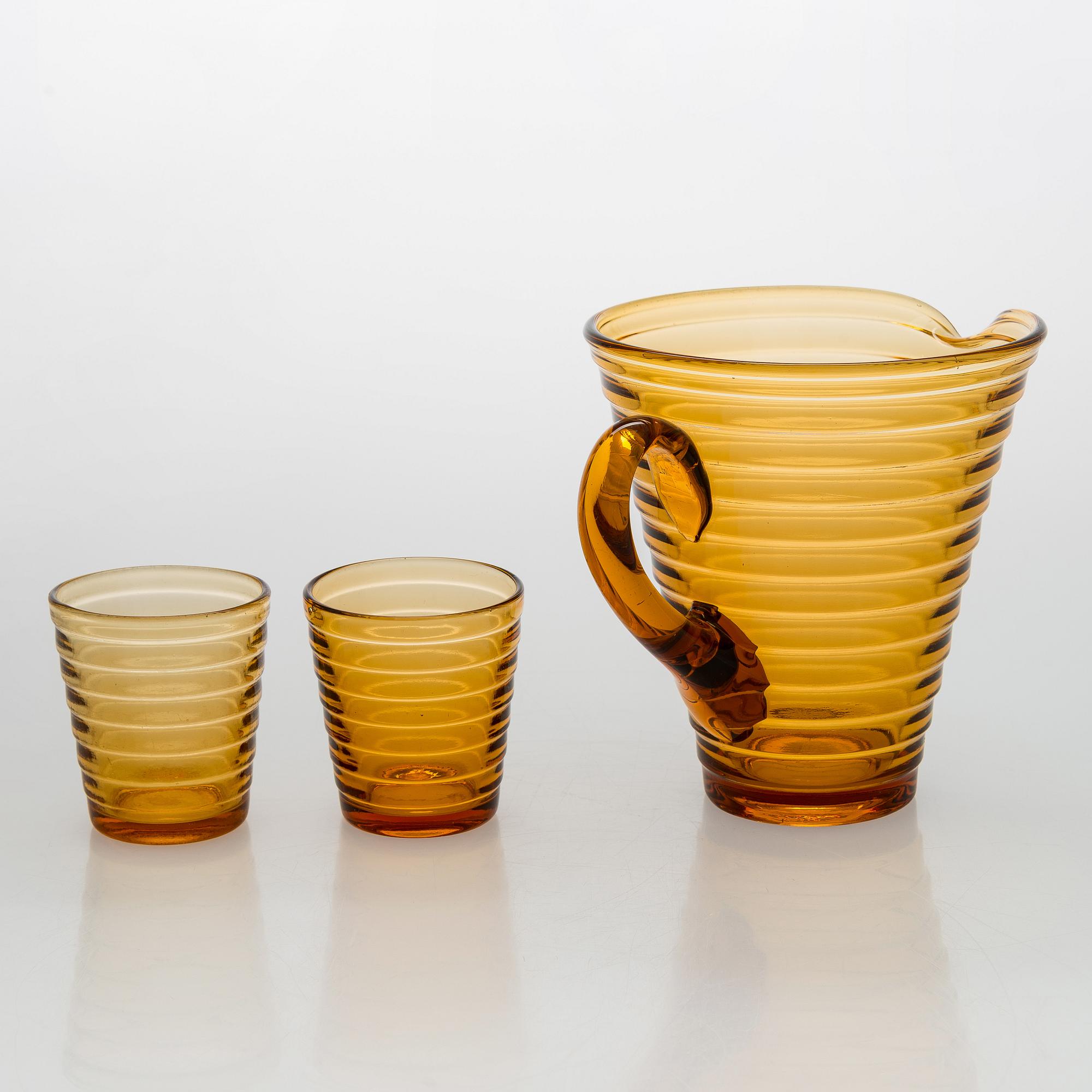 Aino Aalto, A 1930s pitcher model 4644 and two drinking glasses model 4056 for Karhula for Karhula Glassworks, Finland.