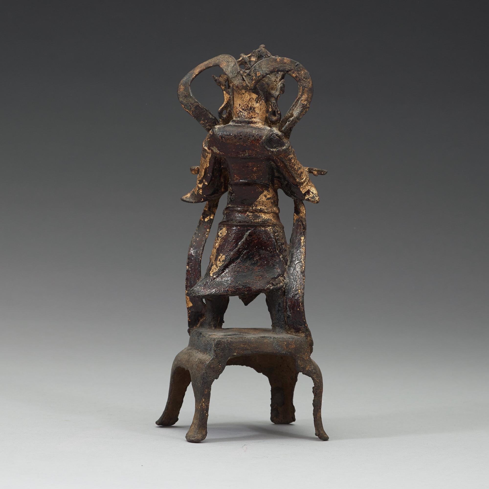A gilt bronze figure of a guardsman/warrior, Ming dynasty (1368-1644).