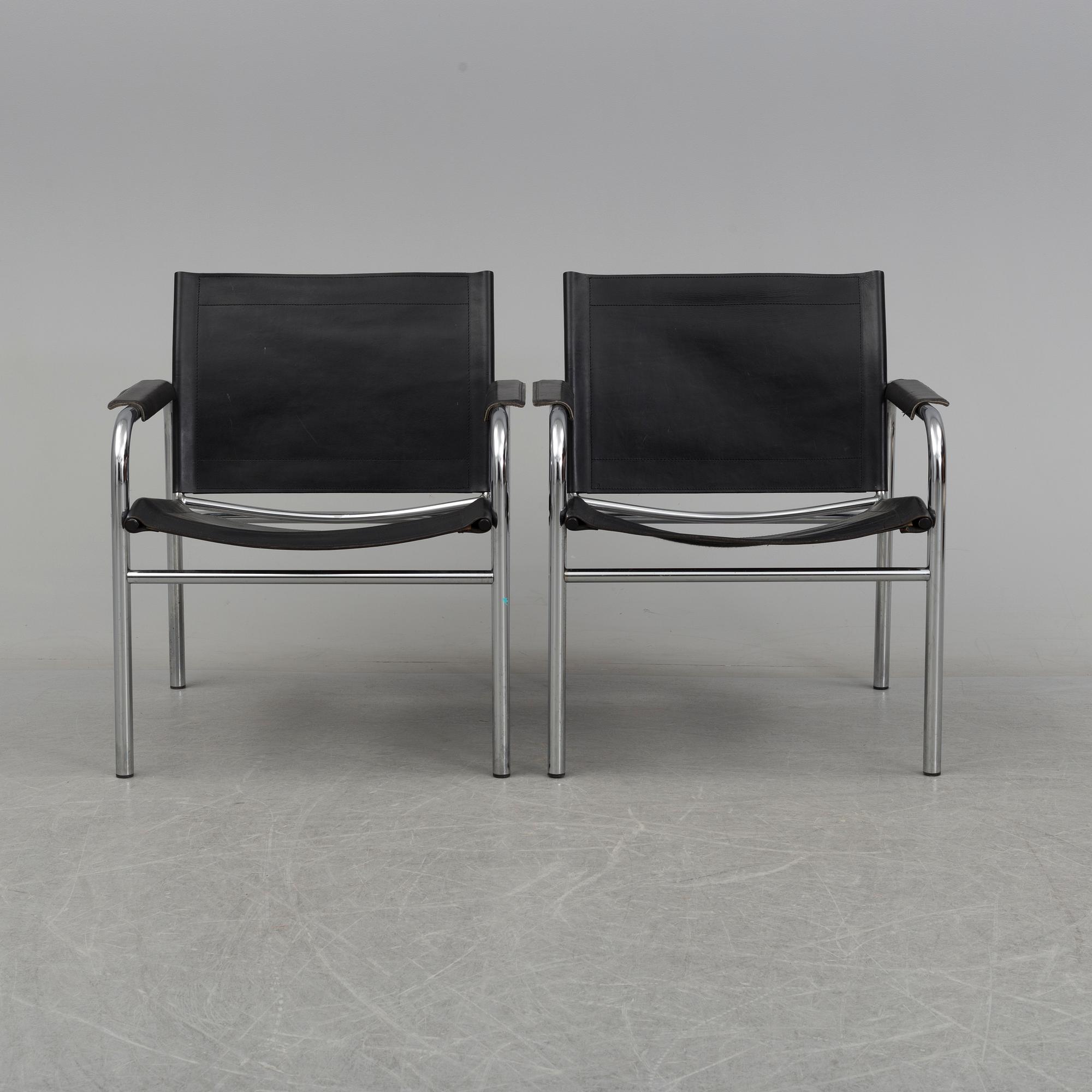 TORD BJÖRKLUND, a pair of 'Klinte' tubular steel easy chairs from IKEA.