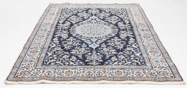 A part silk Nain rug, c 250 x 155 cm.