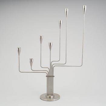 PIET HEIN, a stainless steel candelabrum, 21st Century.