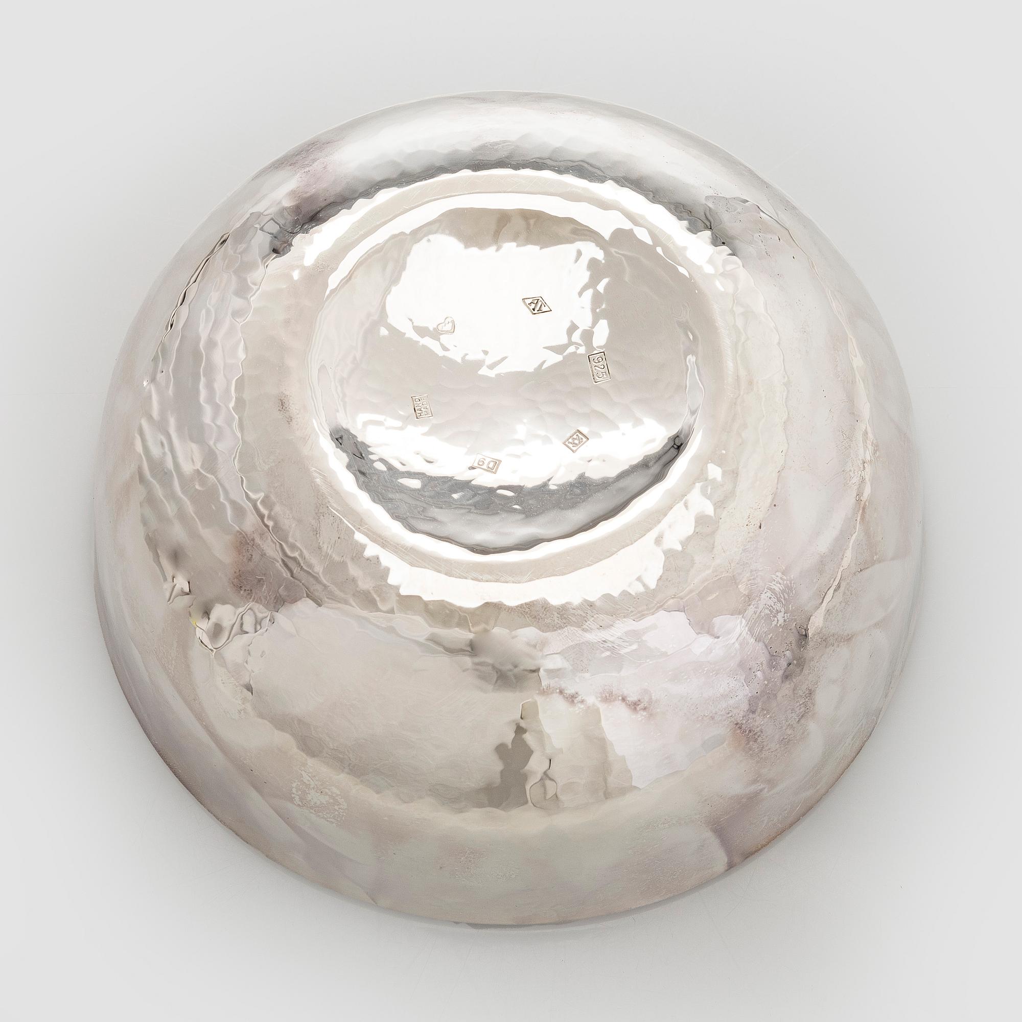 A set of three sterling silver and enamel bowls, maker's mark of A. Tillander, Turku 2005.