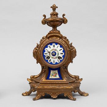 A Louis XVI-style mantel clock, circa 1900.