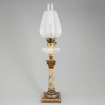 A paraffin lamp, circa 1900.