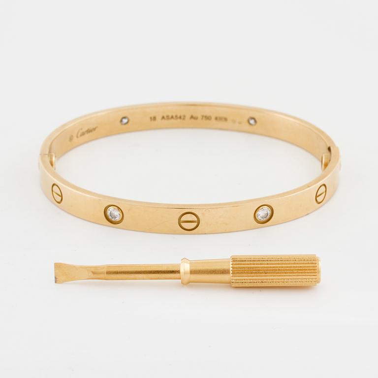 CARTIER, Love bracelet with four brilliant cut diamonds ca 0.40 ct in total.