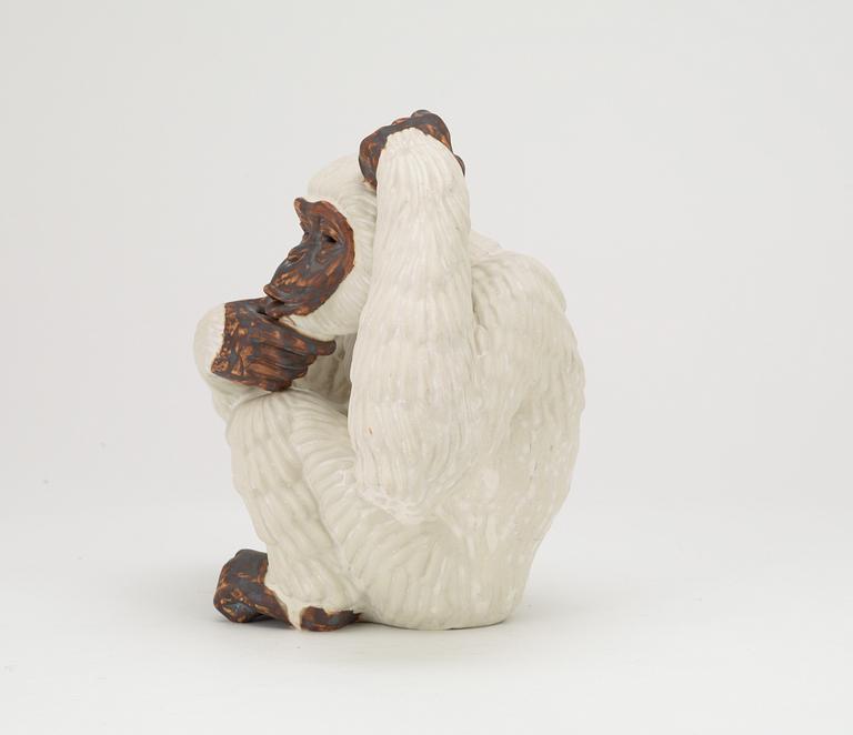 A Gunnar Nylund stoneware figure of a chimpanzee, Rörstrand.