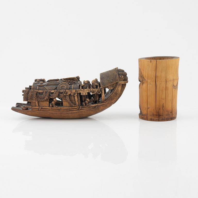 A Chinese carved bamboo brush pot and boat, early 20th Century.