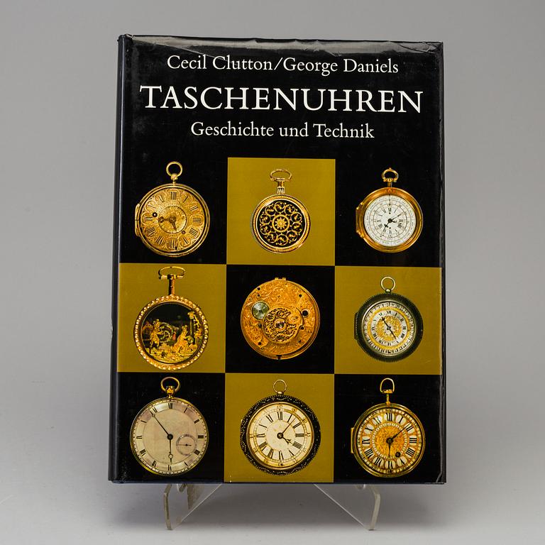 A set of 5 watch books.