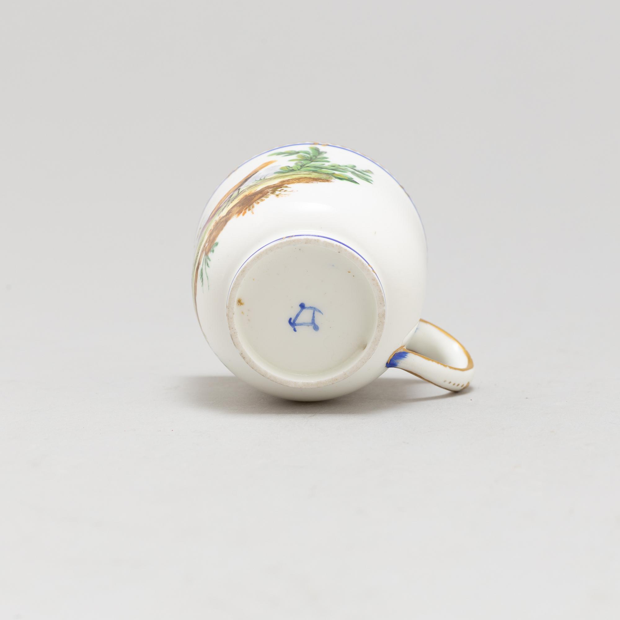 A pair of cups and saucers, "Sévrès"like mark, 19th century.