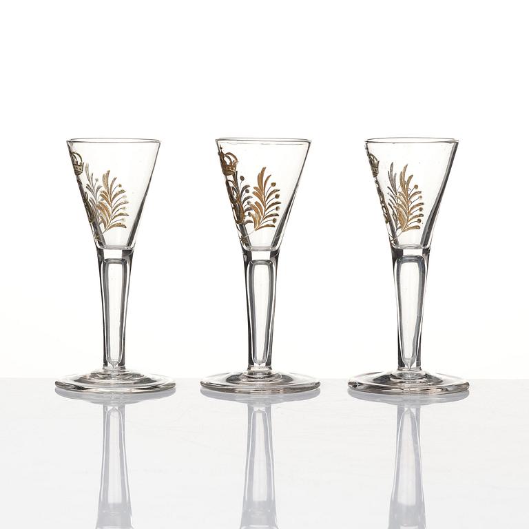 A set of six glasses and a bottle, Sweden, 18th century with King Gustavus IIIs monogram.