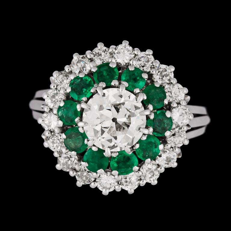 An old cut diamond, app. 1.70 ct, and emerald ring.