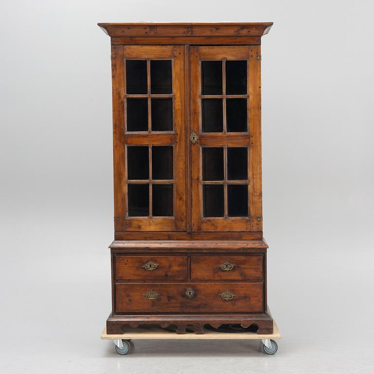 A 18th century vitrine cabinet.