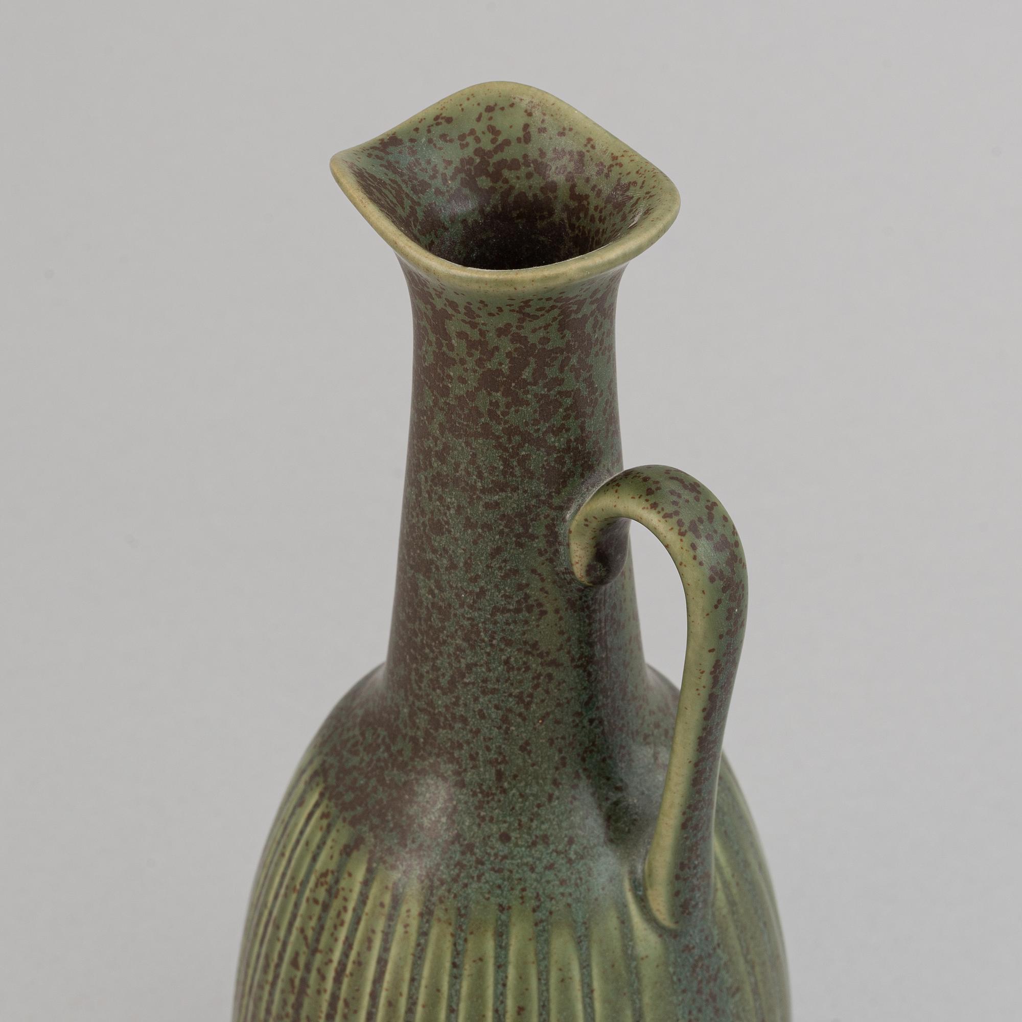 Gunnar Nylund, a set of six stoneware bowls, two miniature vases and a vase for Rörstrand.