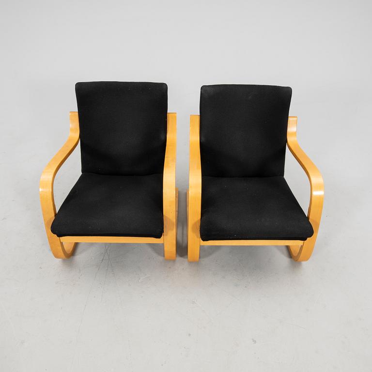 Alvar Aalto, a pair of armchairs model 402 Artek Finland second half of the 20th century.