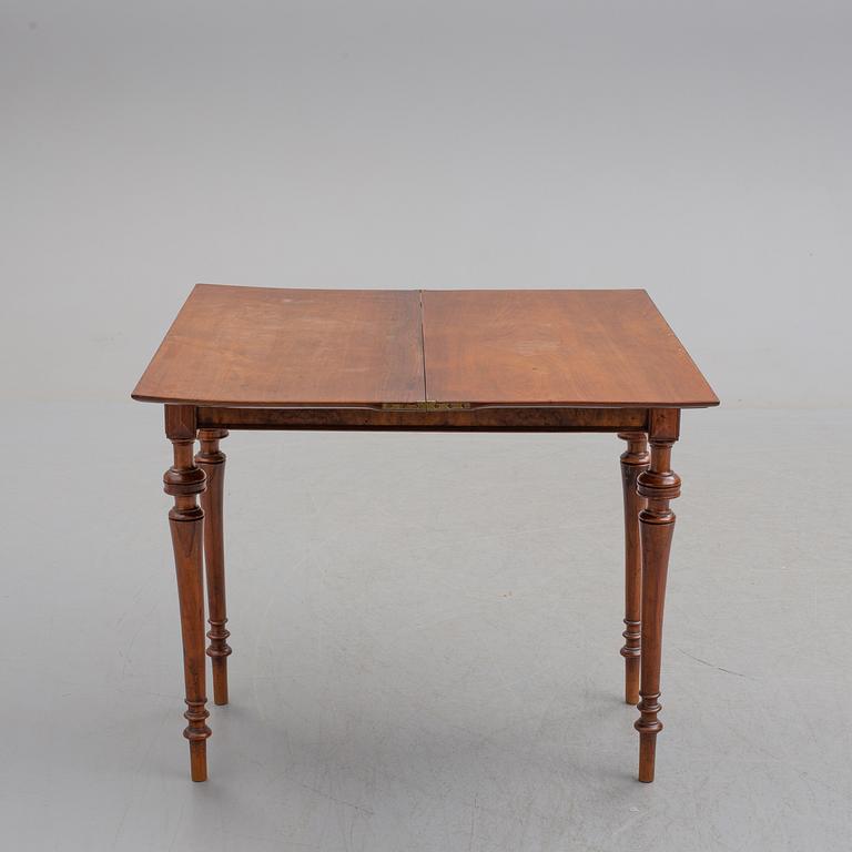A late 19th century mahogany card table.