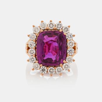 An unheated 9.55 ct fancy pink sapphire and brilliant-cut diamond ring. Certificate from Gübelin.