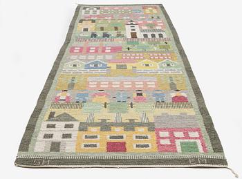 Edna Martin, a flat weave runner, c. 335 x 104 cm signed SH EM.