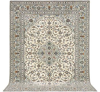 A Kashan carpet, c. 400 x 290 cm.