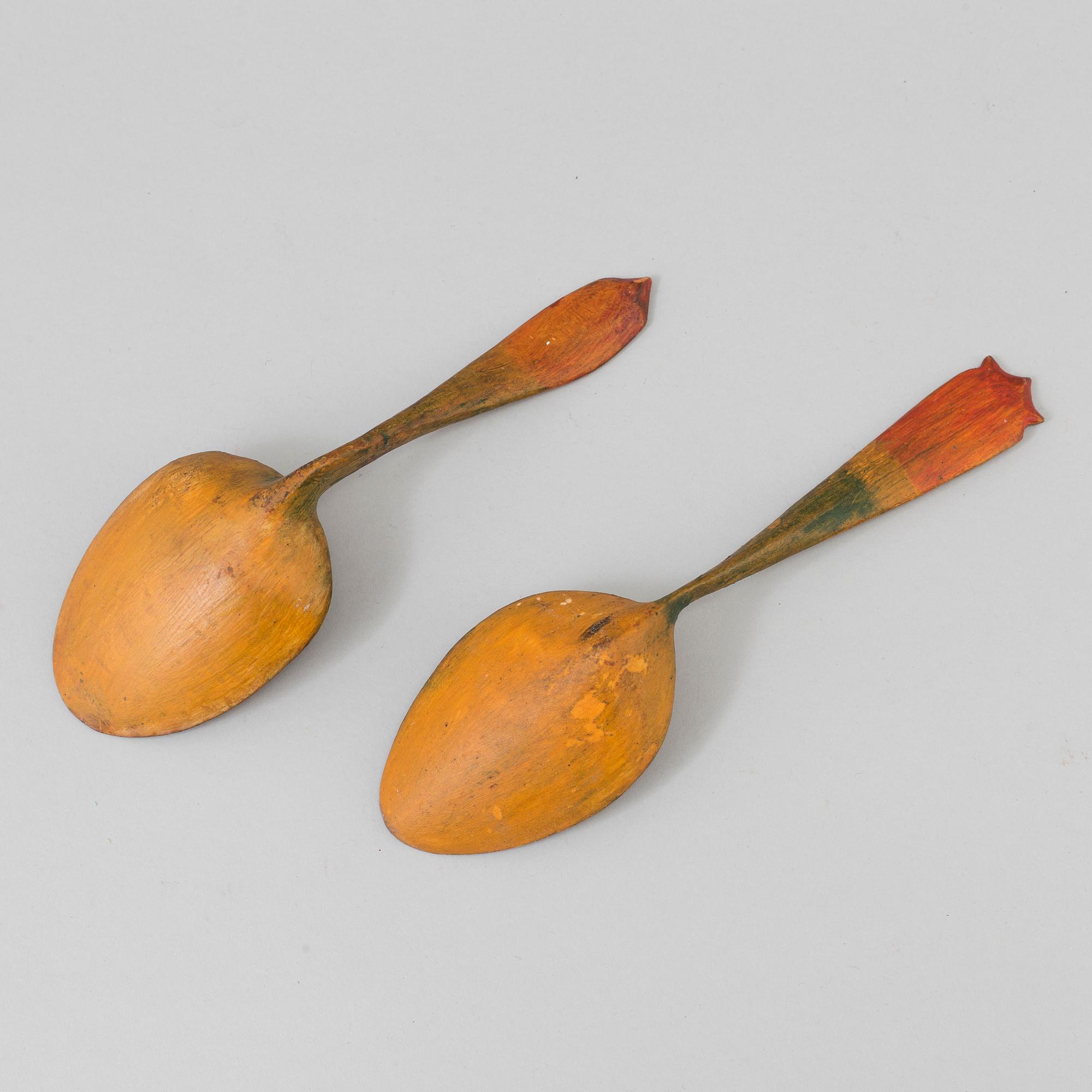 two wooden spoons from the 19th century.