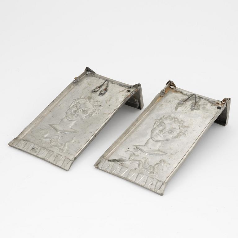 David Wretling, a pair of 1920's/30's Swedish Grace pewter wall sconces, signed.