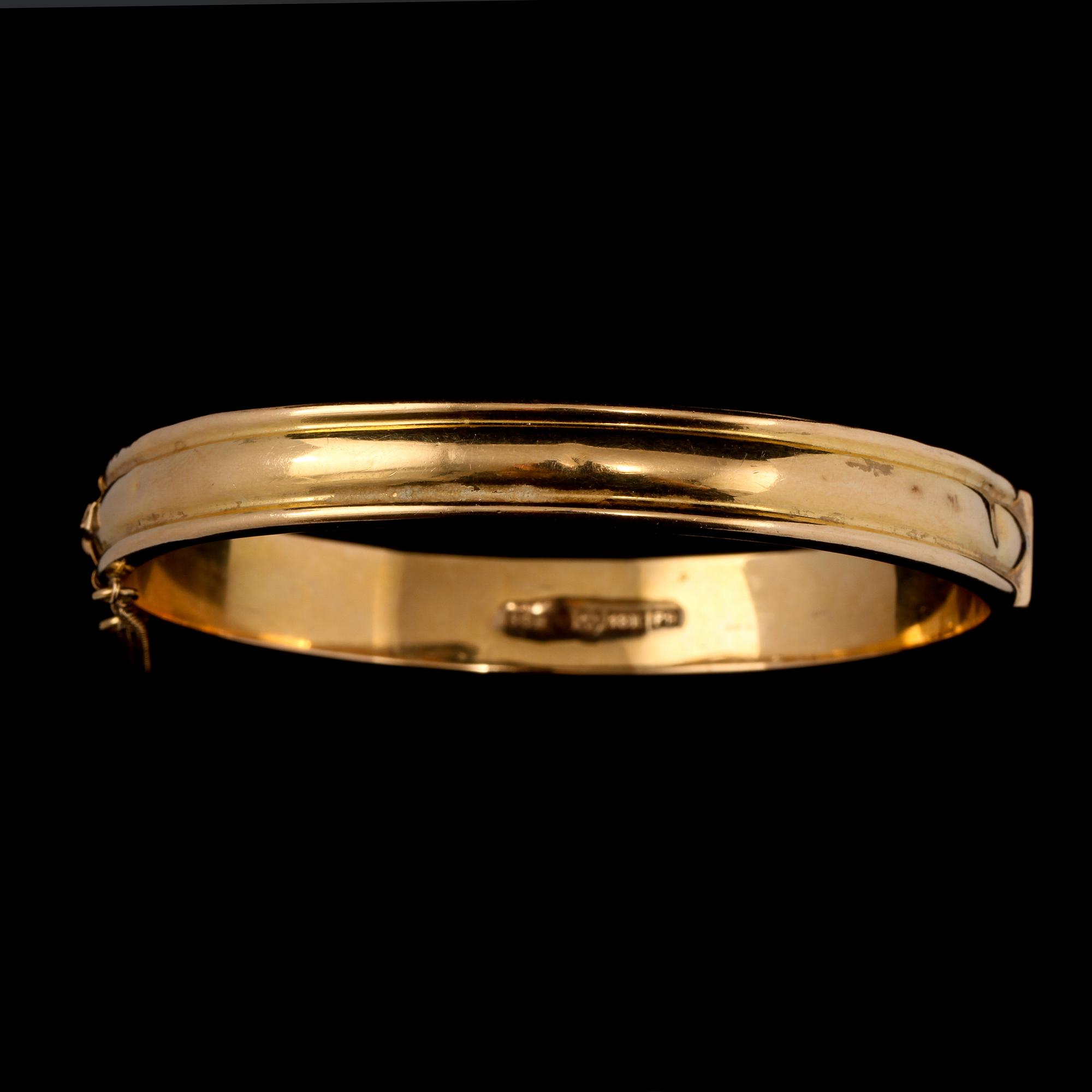 ARMRING, 18k guld, Hildens Guldvaror, Sala, 1953. Vikt 13 g.