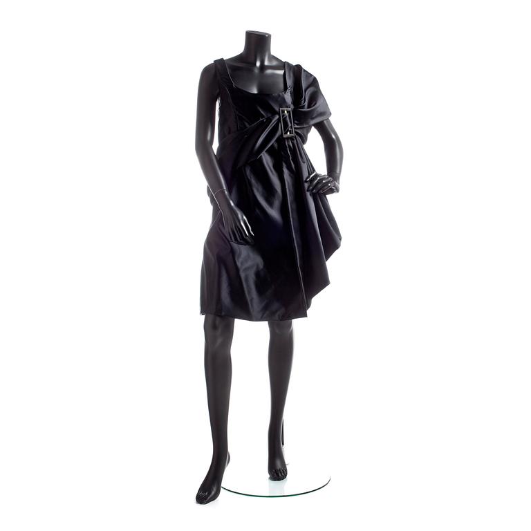CHRISTIAN LACROIX, a black cocktail dress.