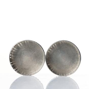 Firma Svenskt Tenn, a pair of polished pewter coasters, Stockholm 1950.