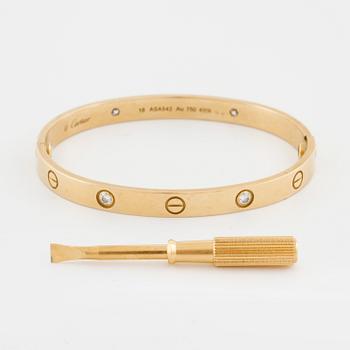 CARTIER, Love bracelet with four brilliant cut diamonds ca 0.40 ct in total.