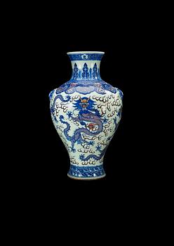 A large blue and white and red dragon vase, Qing dynasty, with Qianlong seal mark.