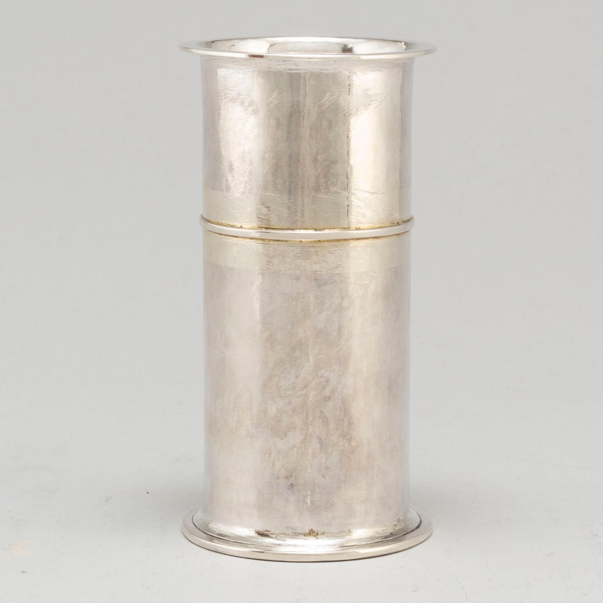 A sterlingsilver vase by Birger Haglund.