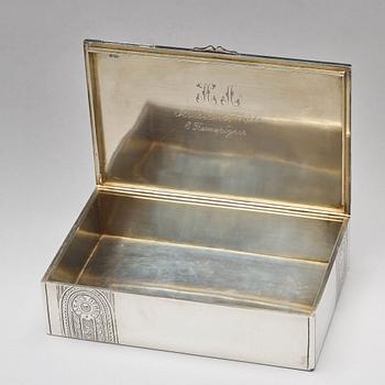 A Russian early 20th century parcel-gilt silver cigarr-box, unidentified makers mark, Moscow 1908-1917.