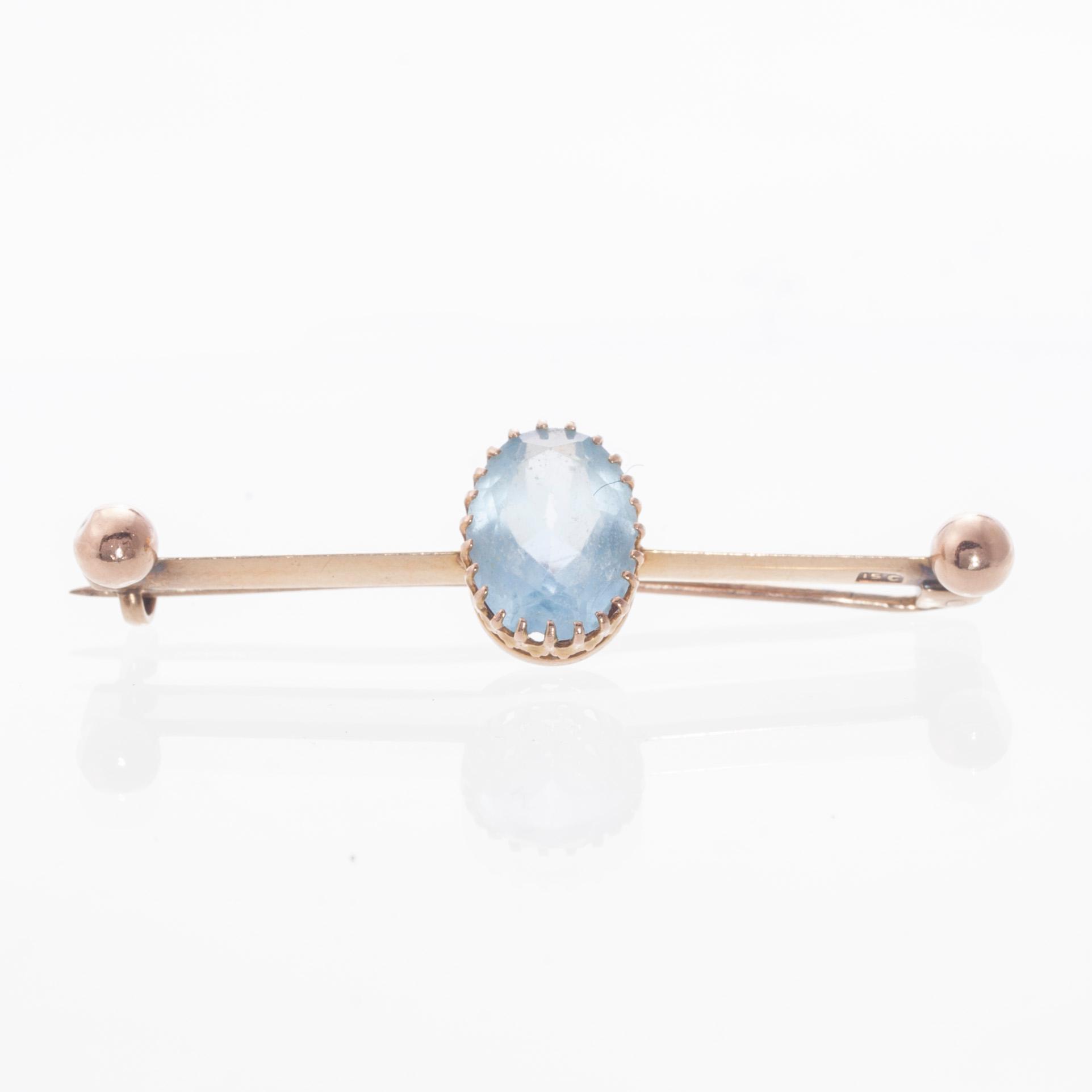 BROSCH, 14K guld, blått glas. Troligtvis England. Vikt ca 3,7 g.