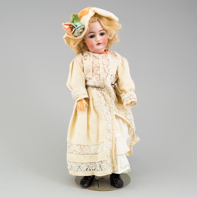 a Franz Schmidt & Co porcellain doll from the early 20th century.